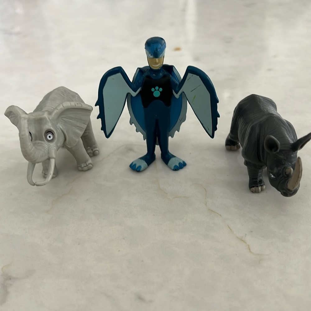Martin wild Kratts toy turtle with accompanying wild kratts elephant and rhino
